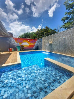 Casa com Piscina e 3 Quartos Climatizados 8km do Centro
